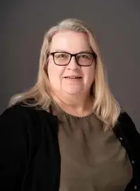 headshot of woman in glasses
